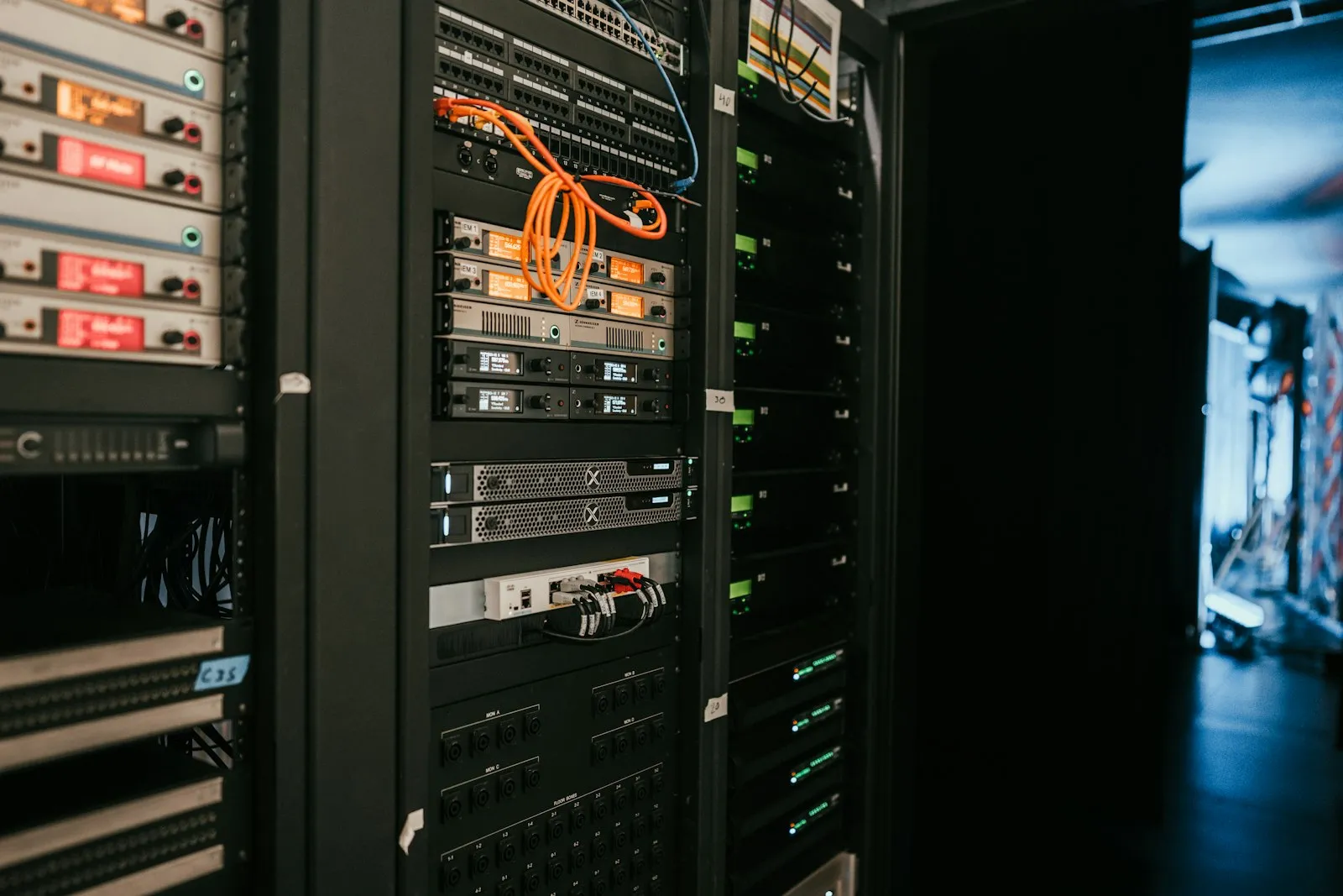 Server rack with patch cables and status lights in a data center